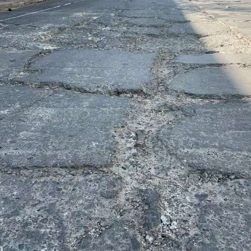 山城路面起砂露石子修补料